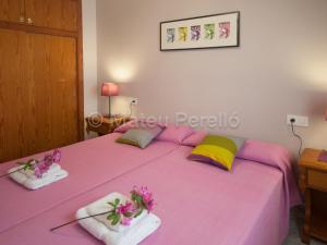 Postel nebo postele na pokoji v ubytování Apartamentos Obelisc