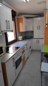 Kuchyň nebo kuchyňský kout v ubytování Apartamentos GO - Tordesillas House