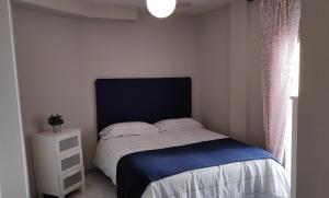 Postel nebo postele na pokoji v ubytování Apartamentos GO - Tordesillas House
