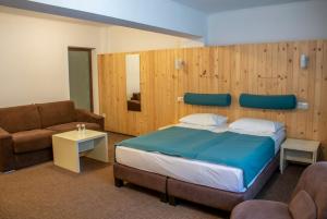 Postel nebo postele na pokoji v ubytování Complex Hotelier COTA O MIE