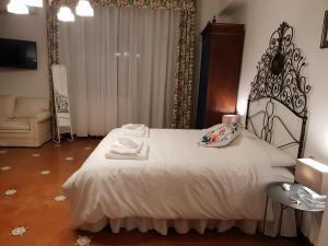 Postel nebo postele na pokoji v ubytování La terrazza di Anna