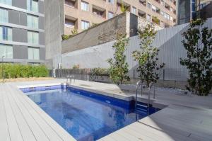 Swimmingpoolen hos eller tæt på Hoom Apartments Juan Bravo
