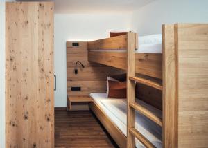 Posteľ alebo postele v izbe v ubytovaní Hotel Edelweiss Superior