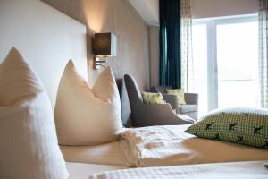 Voodi või voodid majutusasutuse Hotel Hubertushof toas