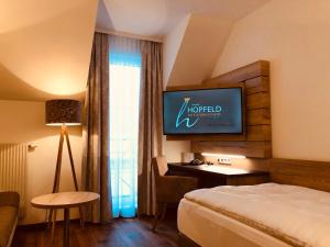 Postel nebo postele na pokoji v ubytování Familie Hopfeld - Hotel Dreikönigshof