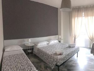Postel nebo postele na pokoji v ubytování MyRoom In Town