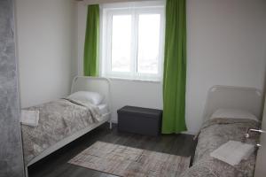 Łóżko lub łóżka w pokoju w obiekcie Apartment St. Pölten