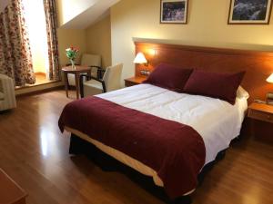 Postel nebo postele na pokoji v ubytování Hotel Camino Real