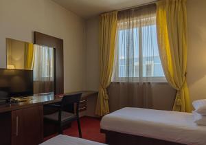 Postel nebo postele na pokoji v ubytování Hotel Concordia + 37 fotografií