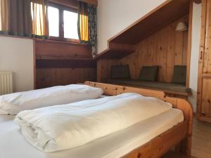 Voodi või voodid majutusasutuse Appartements Rosenstockl toas