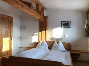 Voodi või voodid majutusasutuse Appartements Rosenstockl toas