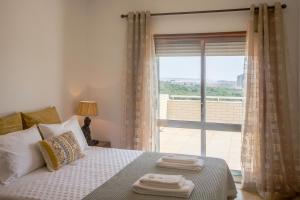 Cama o camas de una habitación en Sea View - Charming Apartment