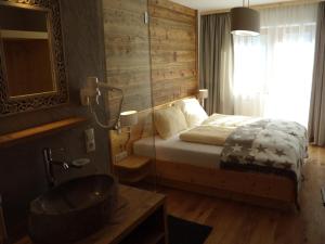 Postel nebo postele na pokoji v ubytování Appartements Schweiberer