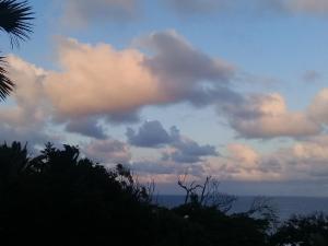 a cloudy sky with the ocean in the background at Wailana lodge in Ramsgate