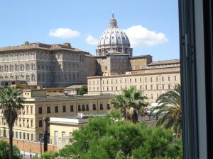 a view of the vatican from a window at Rome Aparts in Rome
