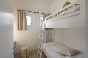 Letto o letti in una camera di CP Resort
