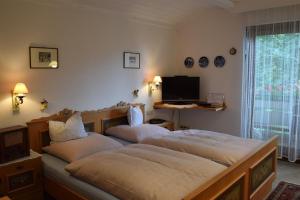 Katil atau katil-katil dalam bilik di Haus Wildbachtobel
