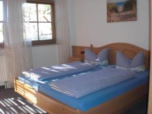 Ένα ή περισσότερα κρεβάτια σε δωμάτιο στο Haus Einstein