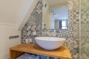 Bagno di ExLibris Boutique Hotel