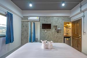 A bed or beds in a room at BA​ Apartment​ Flow​Suvarnabhumi