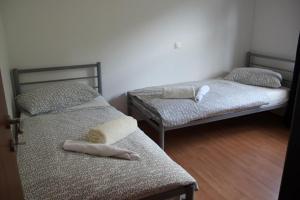 Postel nebo postele na pokoji v ubytování ARA-MARINA