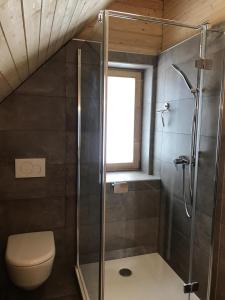 Vannituba majutusasutuses Stubihuettn