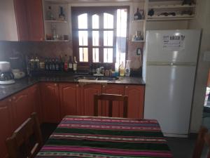 Kuchyň nebo kuchyňský kout v ubytování La Casa de Fede + 17 fotografií