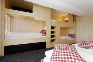 Postel nebo postele na pokoji v ubytování Alpinhotel Bort