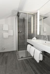Koupelna v ubytování Alpinhotel Bort