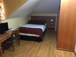 Postel nebo postele na pokoji v ubytování Hotel Camino Real