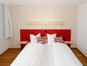 Postel nebo postele na pokoji v ubytování Alpinhotel Bort