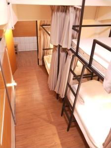 Postel nebo postele na pokoji v ubytování Fuaowo Backpackers Homestay