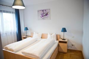 Postel nebo postele na pokoji v ubytování Villa Verona