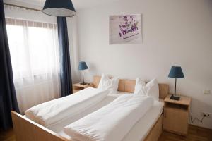 Ένα ή περισσότερα κρεβάτια σε δωμάτιο στο Villa Verona