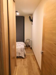 Cama o camas de una habitación en Apartamentos Chevere Naranja
