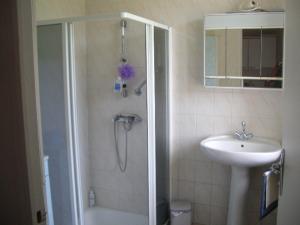 a bathroom with a shower and a sink at 4 Impasse de la Bataillerie in Oyes +25 photos