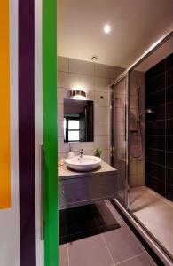 Um banheiro em Les Balcons du Rohan