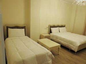 Postel nebo postele na pokoji v ubytování Hotel 3 Vellezerit