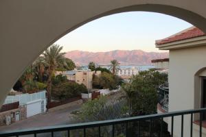 a view of a city from a balcony at Michelle`s Apartment in Eilat