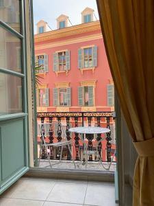 a view of a building from a window at Hyper Centre Place Massena in Nice