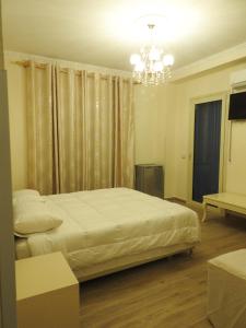 Postel nebo postele na pokoji v ubytování Hotel 3 Vellezerit