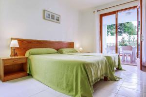 Postel nebo postele na pokoji v ubytování Villa Pou Uno + 5 fotografií