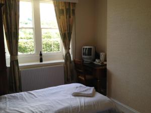 Tempat tidur dalam kamar di Clennell Hall Country House - Near Rothbury - Northumberland