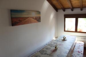 Postel nebo postele na pokoji v ubytování Albergue Vive tu Camino