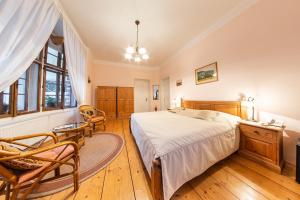 Postel nebo postele na pokoji v ubytování Villa A. Malka