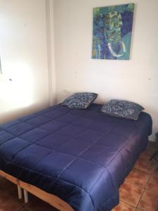 Posteľ alebo postele v izbe v ubytovaní villa casa las fresas