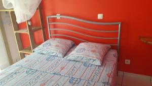 Letto o letti in una camera di ti case gwada location