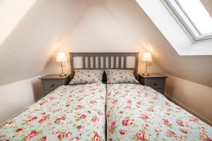 Ένα ή περισσότερα κρεβάτια σε δωμάτιο στο Ganze Wohnung in Bad Buchau am Federsee