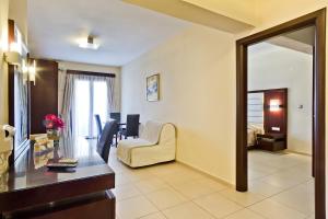 Posezení v ubytování Socrates Hotel Apartments + 14 fotografií