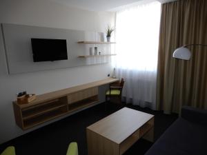 TV a/nebo společenská místnost v ubytování OtavArena
